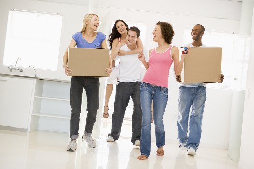Office relocation planning in Poplar with moving boxes and business equipment