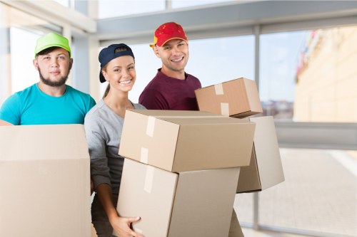 Loading household furniture into a removals van