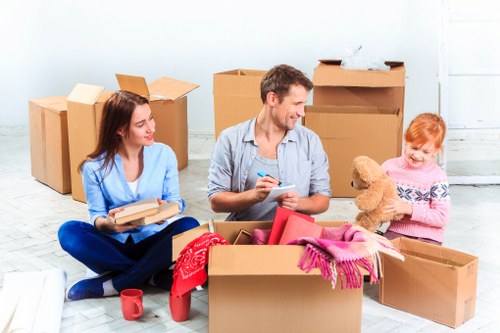 Packing boxes and furniture for a Poplar house or flat move