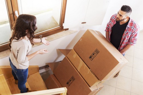 Furniture and boxes being loaded for a Poplar property relocation