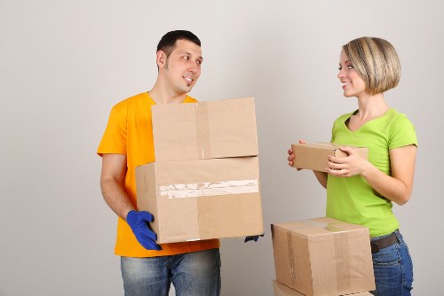 Household boxes and wrapped items prepared for a Poplar relocation